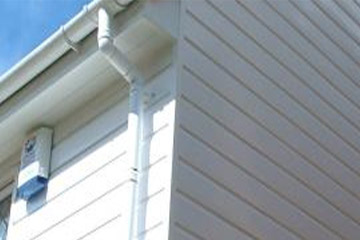 white cladding in roofline system