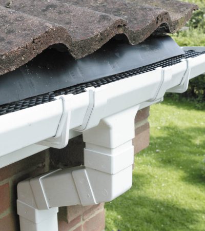 white bevelled guttering with vermin and leaf control